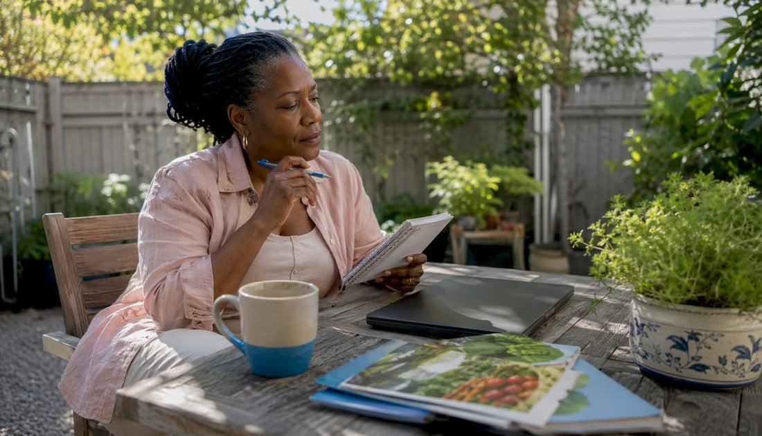 Woman researching wellness products at kitchen table
