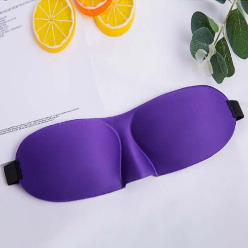 Sleep mask in purple color designed for ultimate comfort and blocking light for restful sleep.