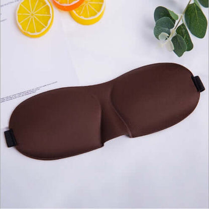 Sleep mask in brown color for ultimate comfort and restful sleep, designed for light blockage and eye movement freedom.