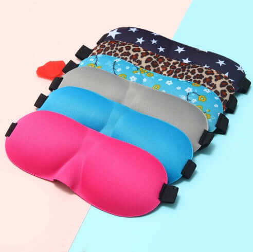 Various colorful sleep masks displayed, featuring unique patterns and a soft, comfortable design for restful sleep.