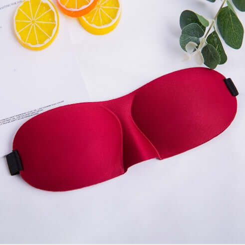 sleep mask in red color, designed for ultimate comfort and light blocking for a restful night.