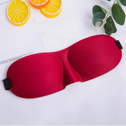sleep mask in red color, designed for ultimate comfort and light blocking for a restful night.