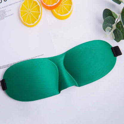Sleep mask in green color designed for ultimate comfort and restful sleep.