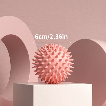Relaxing Foot Massage Ball in pink with spikes, measuring 6cm/2.36in for portable foot relief.
