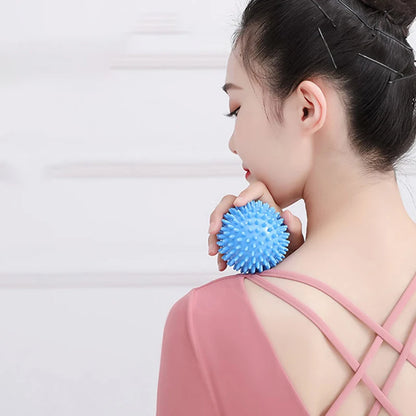Relaxing Foot Massage Ball being held on the back of a woman, showcasing portable relief for tired feet.