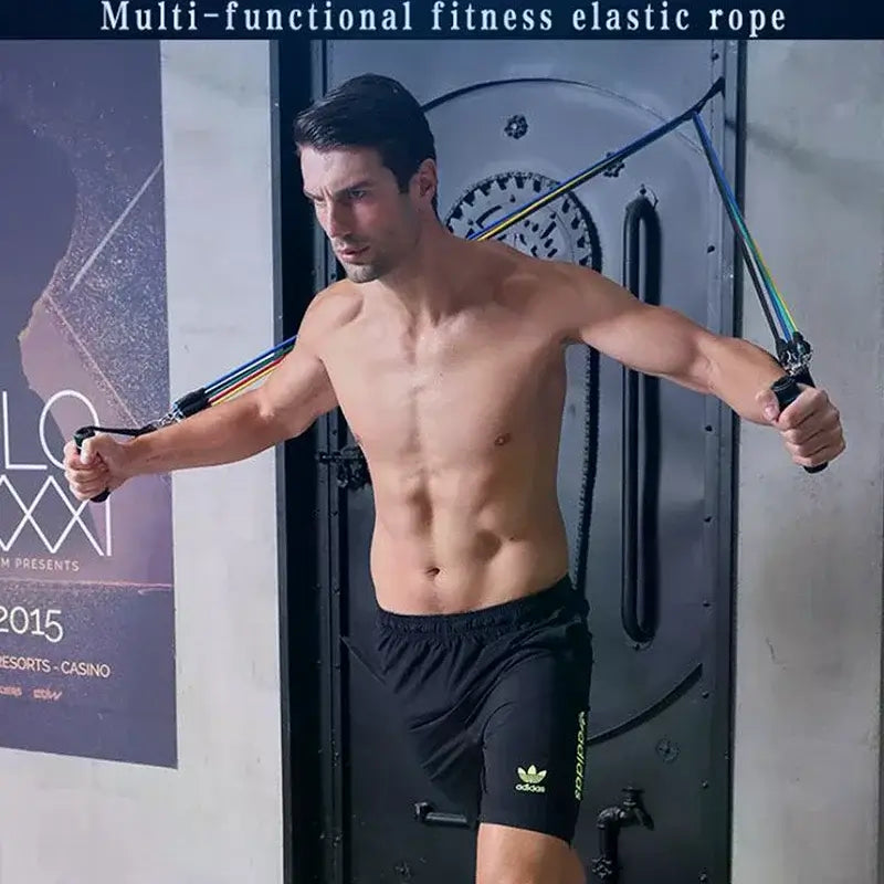 Man using 11-piece resistance bands set for home workouts with multi-functional fitness elastic rope.
